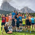 RUNNING Company Laufgruppe vor dem Langkofel in Südtirol